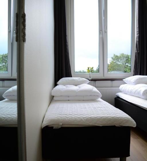 חדר משפחתי חדר אמבטיה משותף, Alkoven Logi