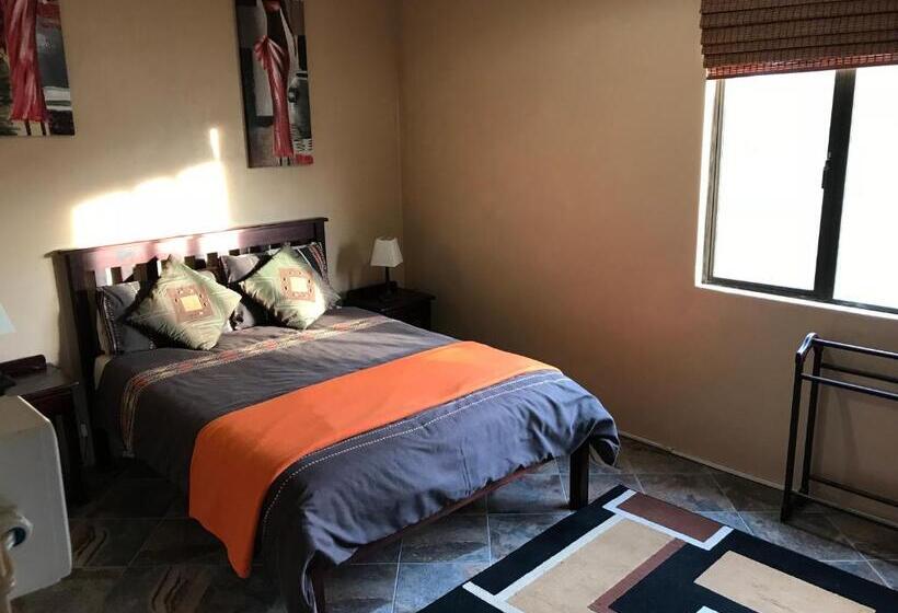 غرفة عائلية, Cheetah Lodge Guest House