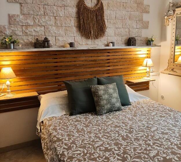 חדר משפחתי, Grotta Dei Puntali B&b