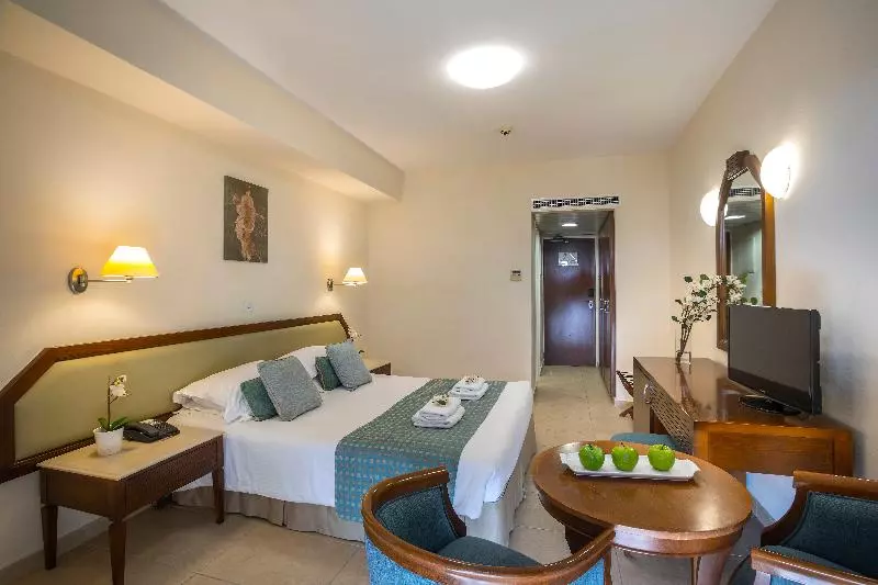 キングサイズベッドのデラックスルーム, Pullman Kuala Lumpur City Centre Hotel & Residences