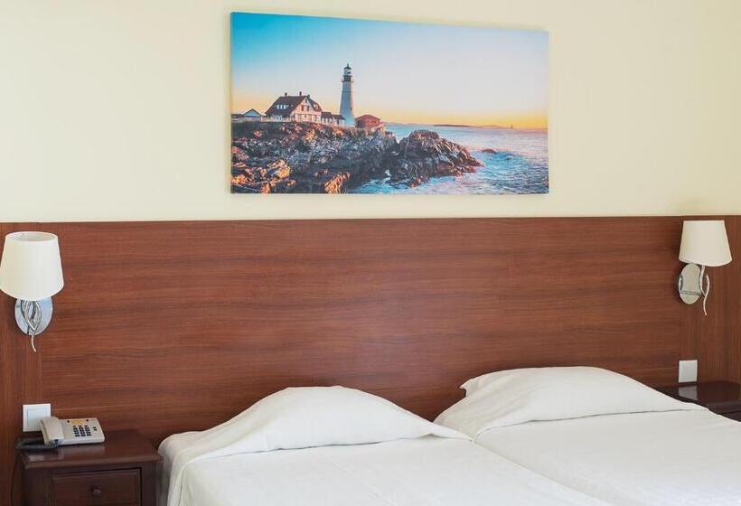 Quarto Estandar, Avenida Praia