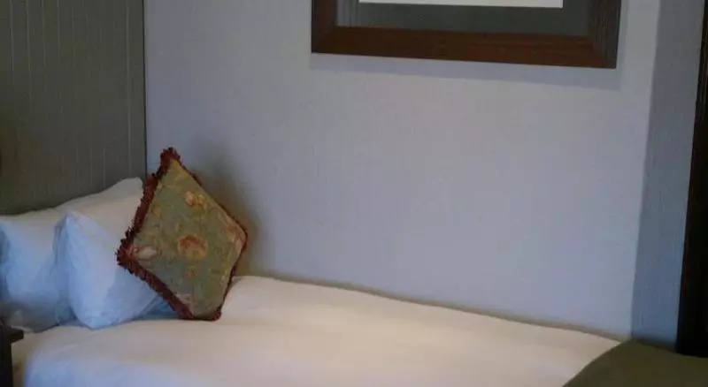 キングサイズベッドのデラックススイート, Red Lion Inn & Suites Grimes