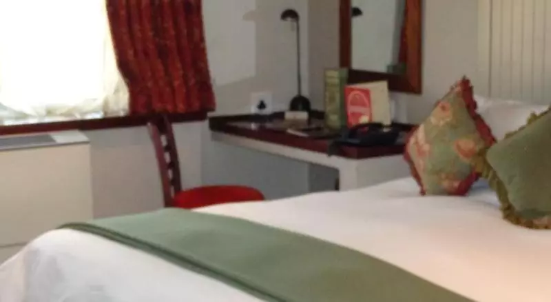 キングサイズベッドのデラックススイート, Red Lion Inn & Suites Grimes