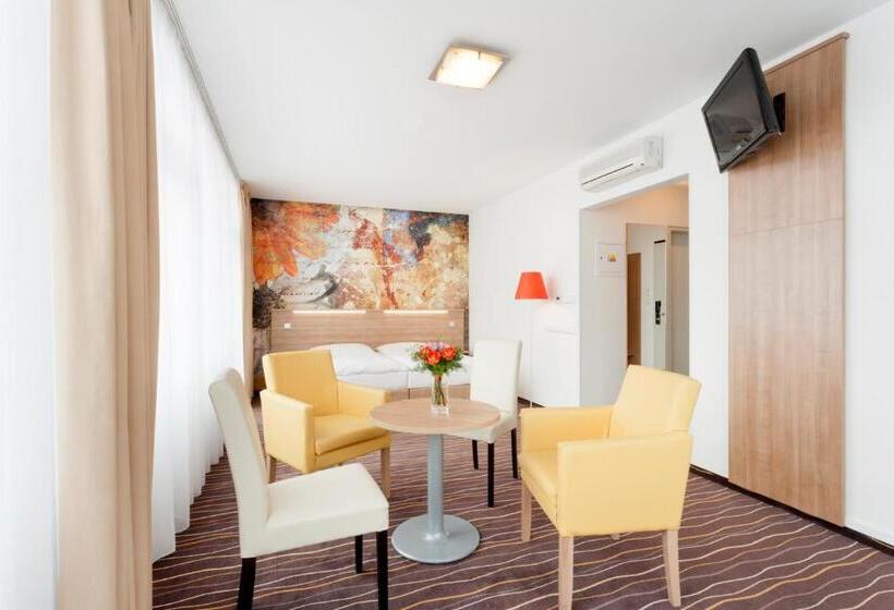 Quarto Executivo, Akcent