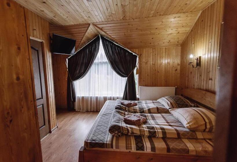 سوییت با چشمانداز کوه, Toga Cottage