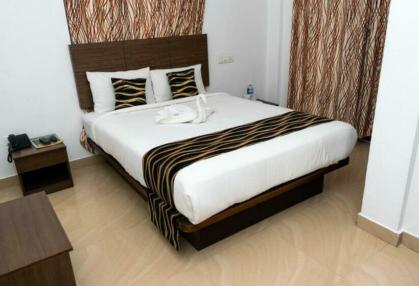 Quarto deluxe, Pine Tree Munnar