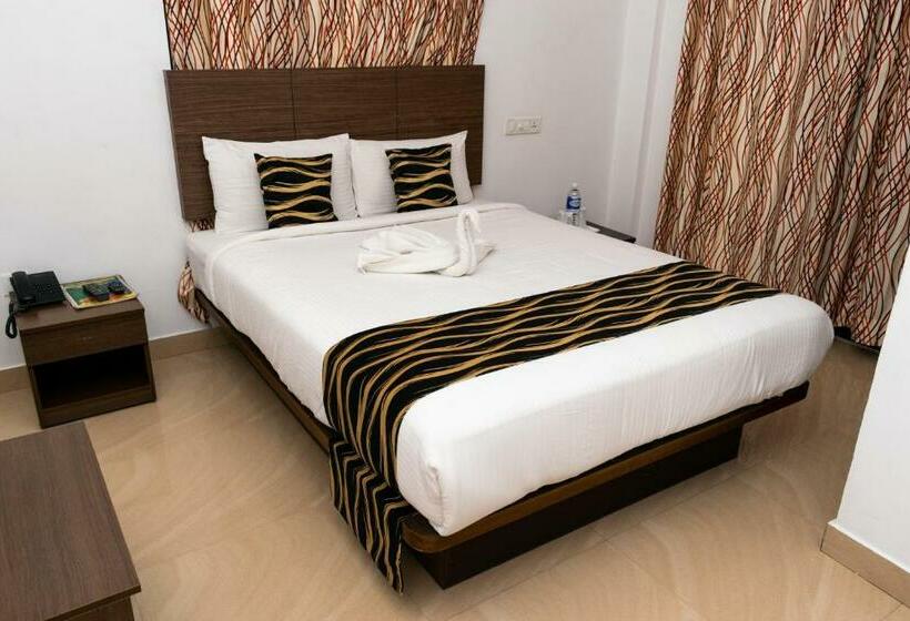 Quarto deluxe, Pine Tree Munnar