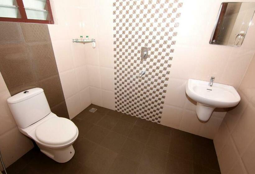 Quarto deluxe, Pine Tree Munnar