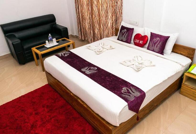 Quarto deluxe, Pine Tree Munnar