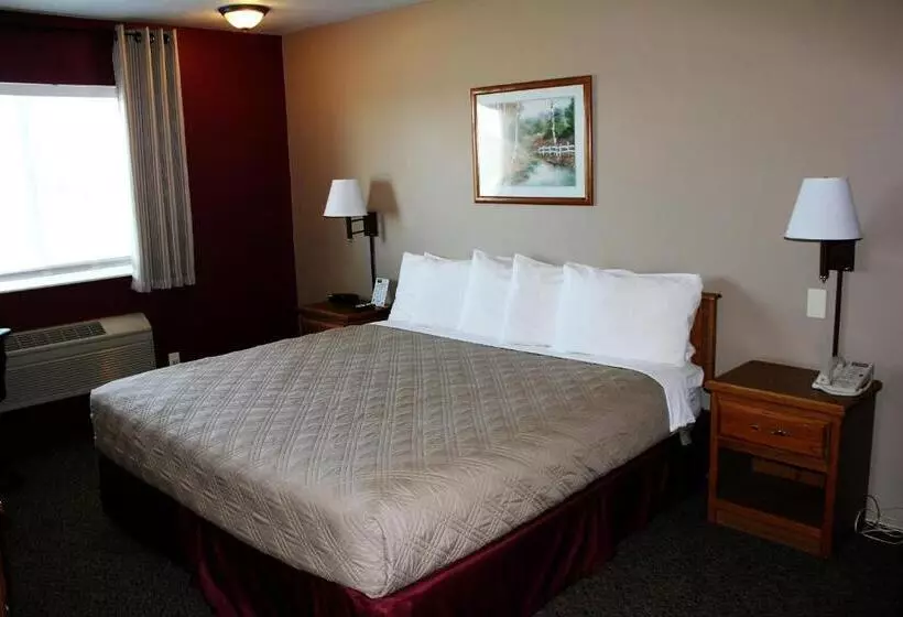 キングサイズベッドのスタンダードルーム, Capri Inn & Suites   Beatrice