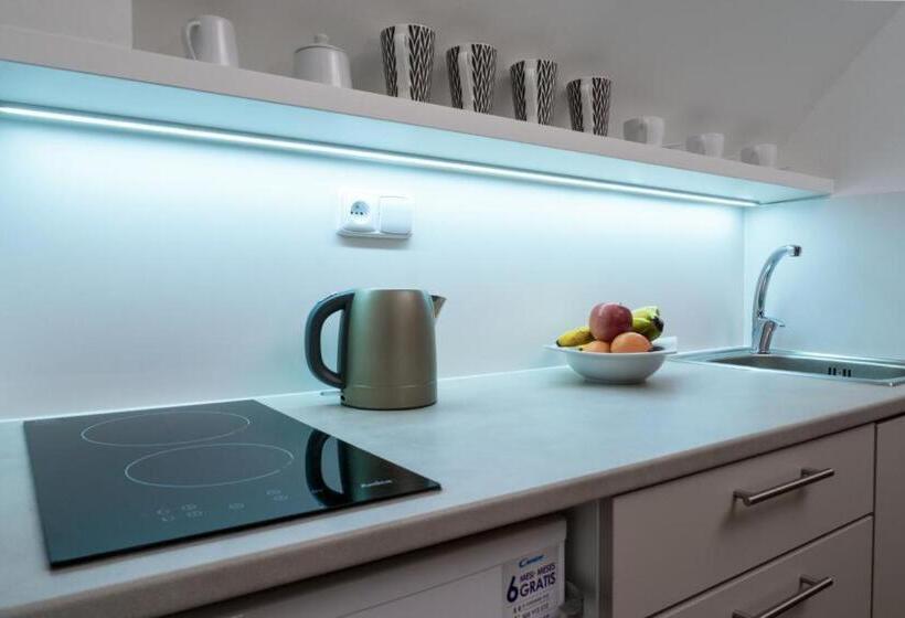 标准工作室, Apartmány Divoký Anděl