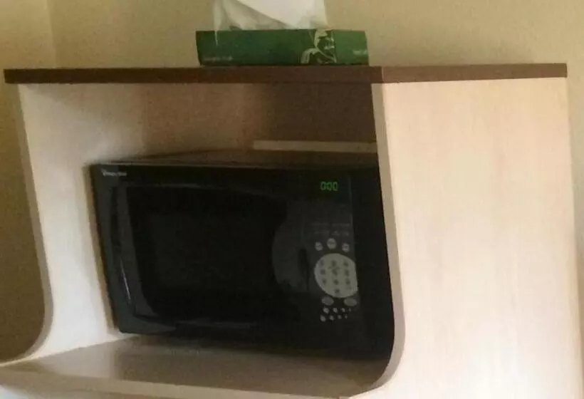 キングサイズベッドのスタンダードルーム, Budget Inn & Suites  Talladega