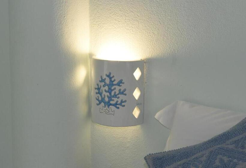 חדר משפחתי, Baja Azzurra