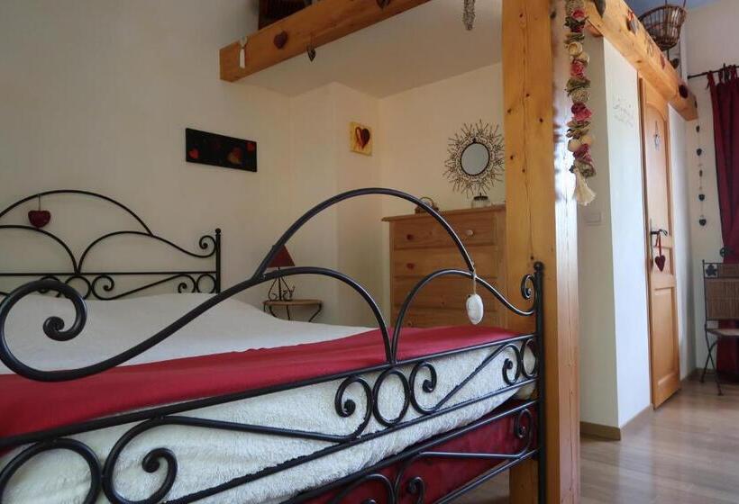 חדר משפחתי, Le Relais Du Grand Logis