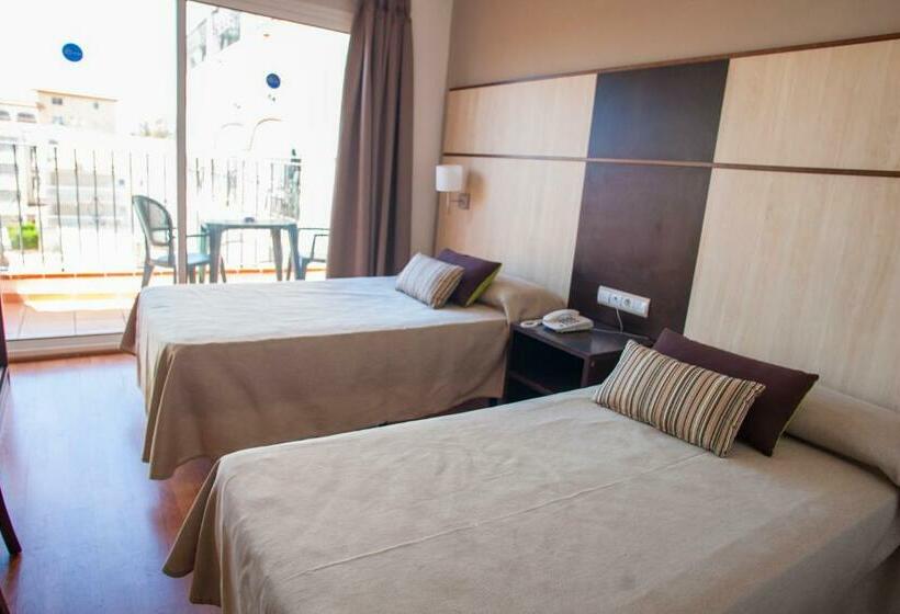 Номер Стандарт, Comarruga Platja