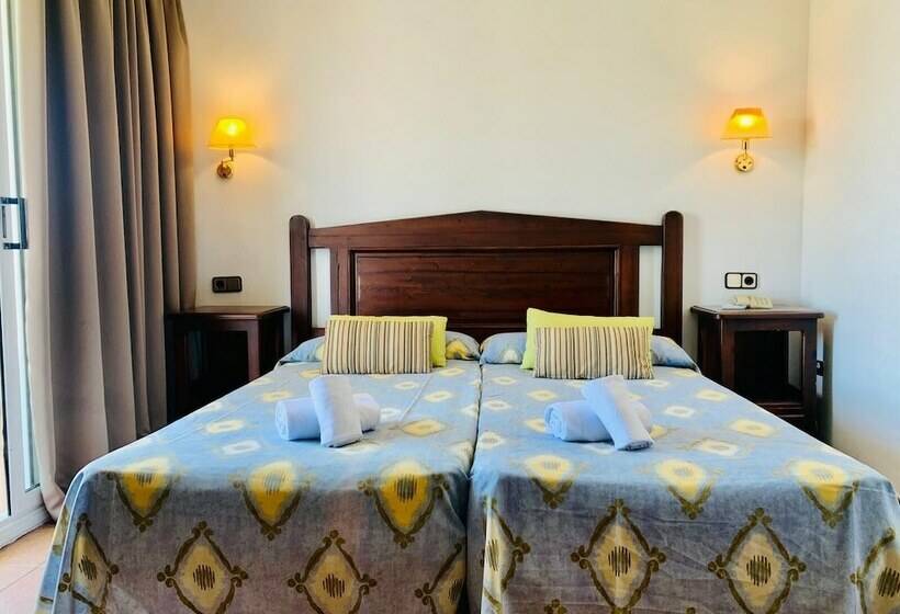 Номер Стандарт, Comarruga Platja