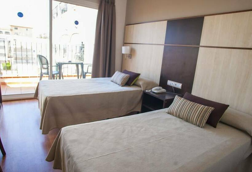 Номер Стандарт, Comarruga Platja