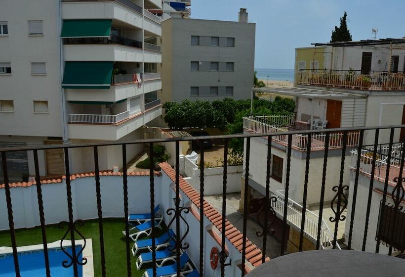 Номер Стандарт, Comarruga Platja