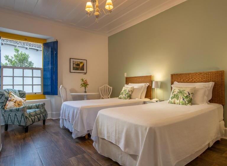 דירת חדר דלוקס, Sandi