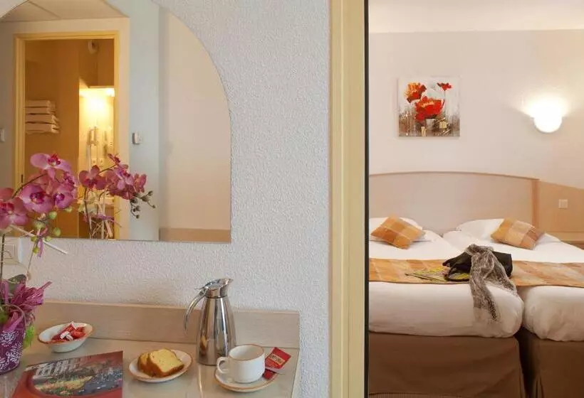 اتاق یک تخته با چشم‌انداز باغ, Hôtel Le Kolibri
