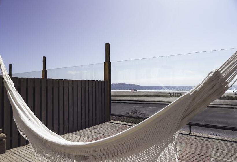 جناح مطلّ علي البحر, Y Cabañas Campanario