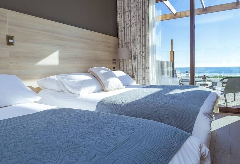 جناح مطلّ علي البحر, Y Cabañas Campanario