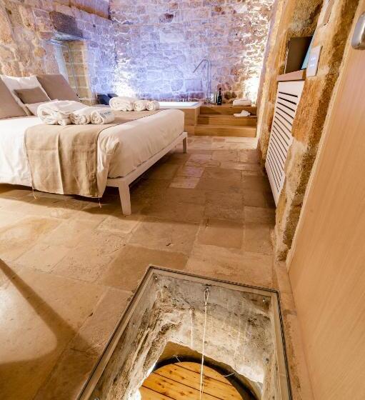 מיטת קינג בסוויטה, Tre Archi Suite & Relais