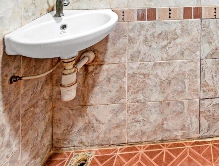 デラックスルーム, Oyo 90487 Wisma Kuta Karang Baru