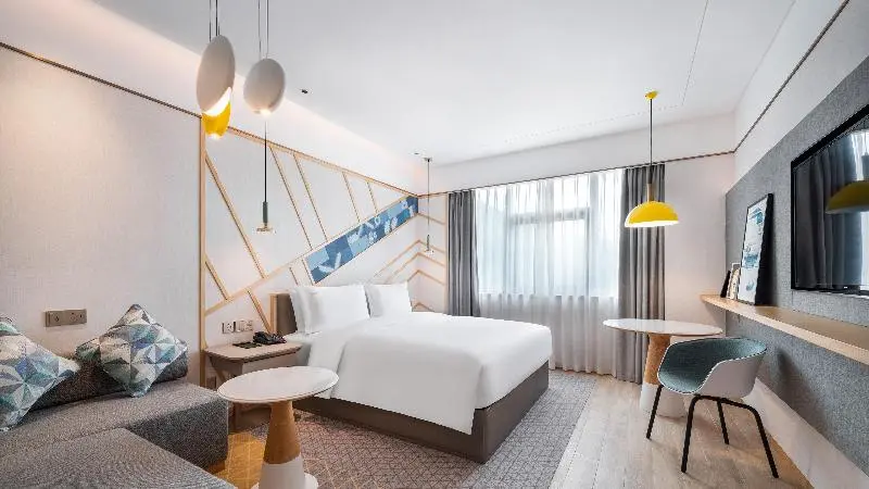 キングサイズベッドのスタンダードルーム, Holiday Inn Tongren Wanshan, An Ihg