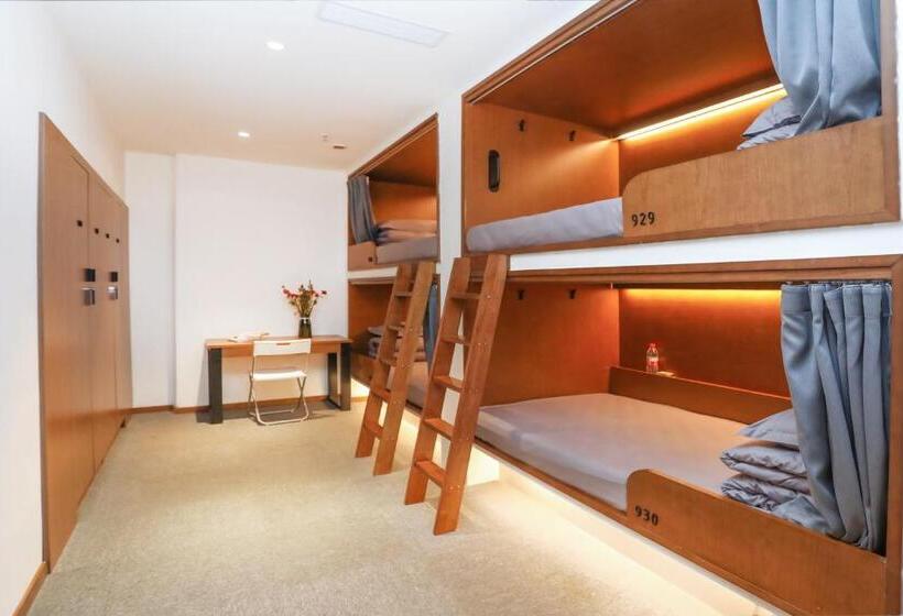 تختخواب در اتاق مشترک, 吃山文化青年旅店