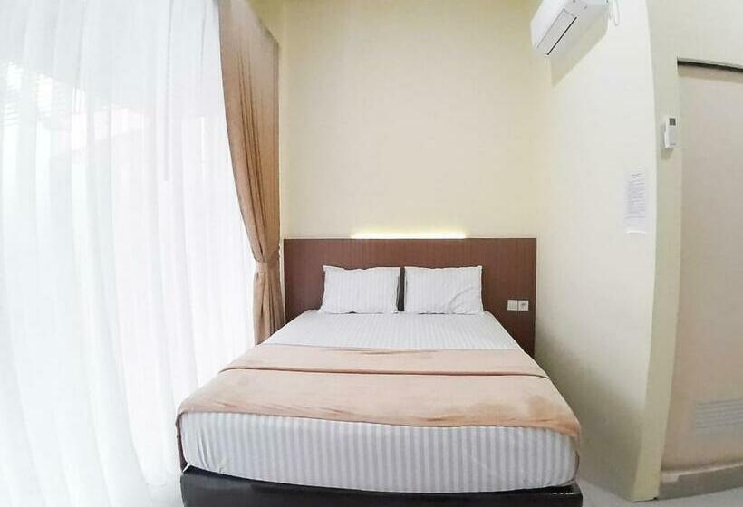 غرفة ديلوكس, Reddoorz Syariah Near Transmart Jambi 2