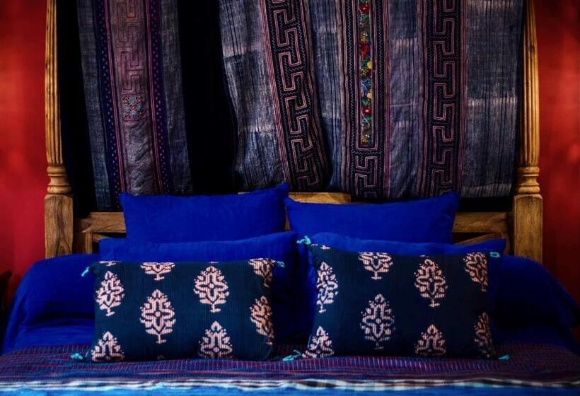 Номер Deluxe, Origines