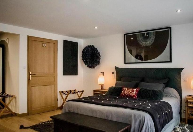 Номер Deluxe, Origines