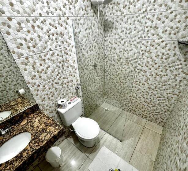 غرفة قياسية رباعية مزودة بشُرفة, Pousada Coconut Cumbuco