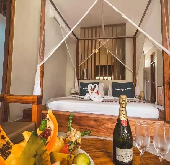 庭の見えるスタンダードトリプルルーム, Zanzibella Hotel & Spa