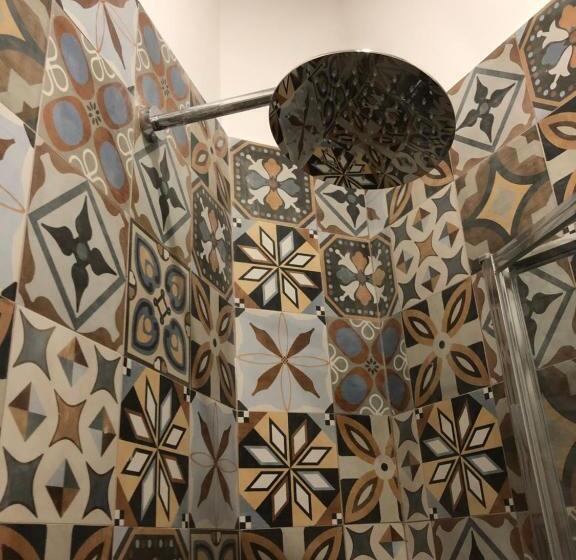 חדר דלוקס לשלושה, Il Pumo Pugliese