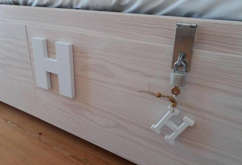 Кровать в Общей Комнате, Origens Hostel