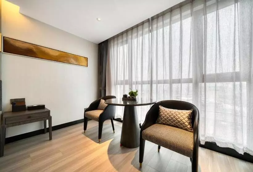 キングサイズベッドのデラックスルーム, Yiwu International Mansion
