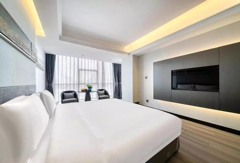 キングサイズベッドのデラックスルーム, Yiwu International Mansion