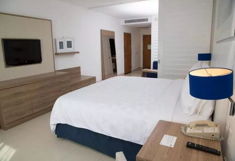 キングサイズベッドのスタンダードルーム, Holiday Inn Acapulco La Isla, An Ihg