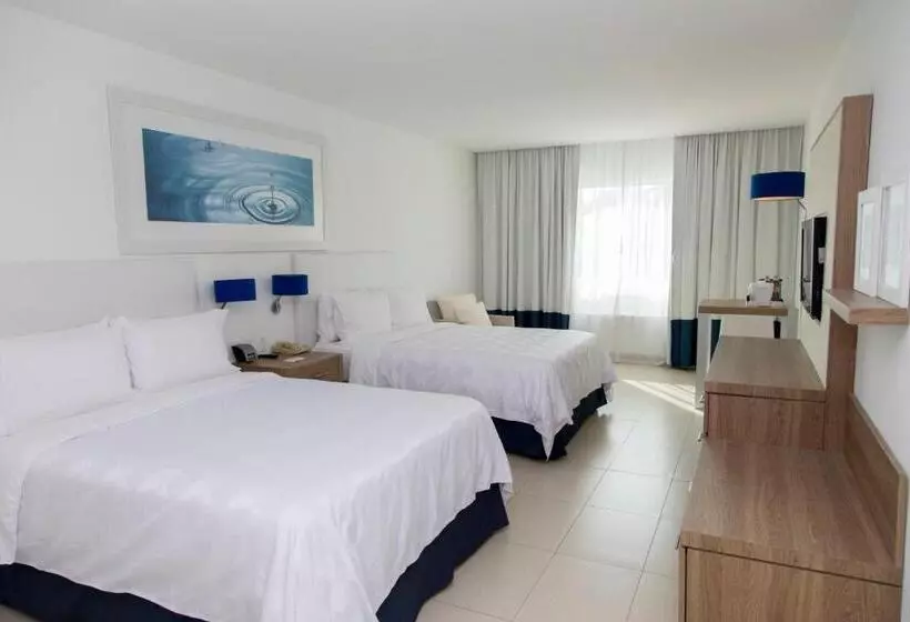 キングサイズベッドのスタンダードルーム, Holiday Inn Acapulco La Isla, An Ihg