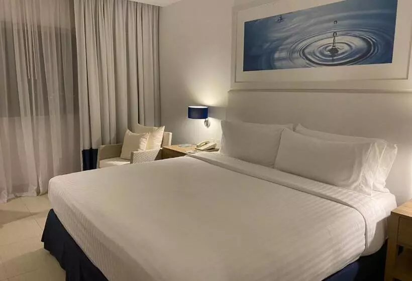 キングサイズベッドのスタンダードルーム, Holiday Inn Acapulco La Isla, An Ihg