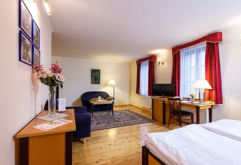 Номер Deluxe, Maltezský Kříž