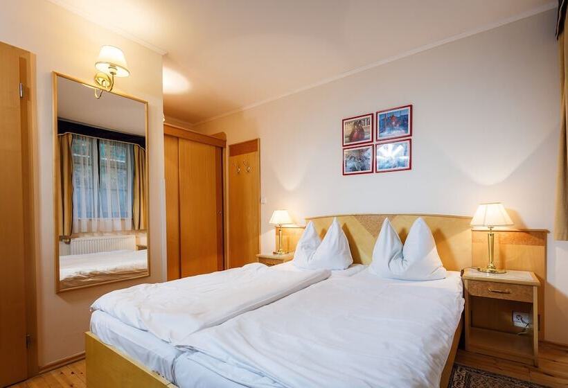 Номер Стандарт, Maltezský Kříž