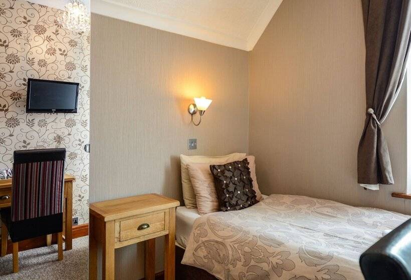 标准单人间共用浴室, Tanes