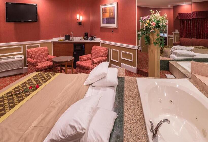 מיטת קינג בסוויטה, Inn Of The Dove Romantic Luxury & Business Suites