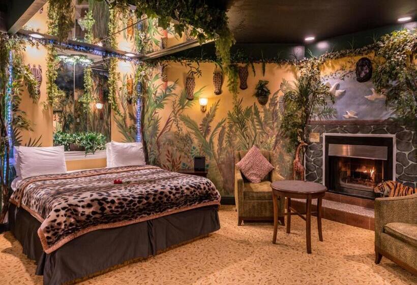 מיטת קינג בסוויטה, Inn Of The Dove Romantic Luxury & Business Suites