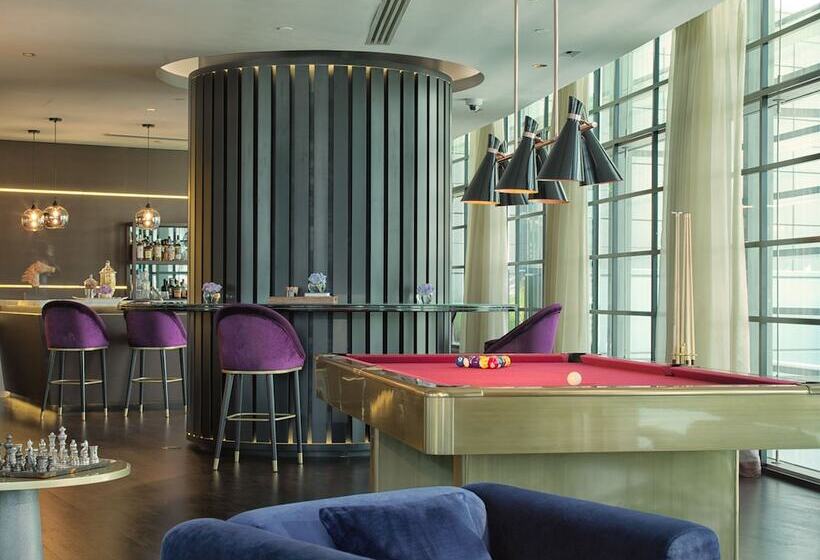 キングサイズベッドのクラブルーム, Rosewood  Abu Dhabi