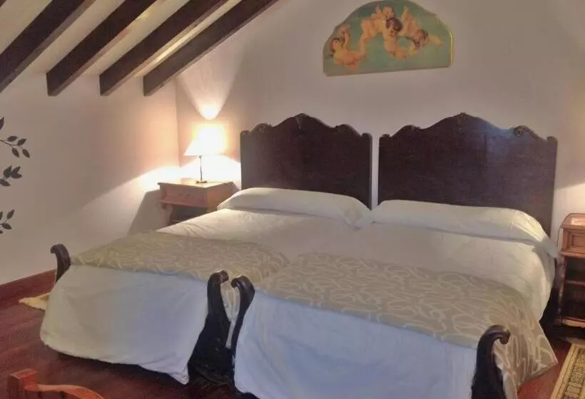 スタンダード4人部屋, Trisileja En Puente Romano