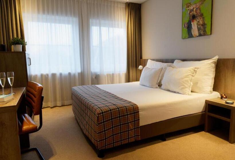 غرفة كومفورت, De Koepoort